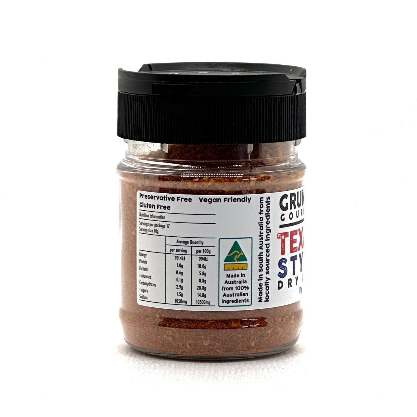Grund's Gourmet Texas Style Dry Rub in action, seasoning a variety of meats for grilling and smoking, showcasing its rich ingredients like garlic and chili powder for the ultimate BBQ experience