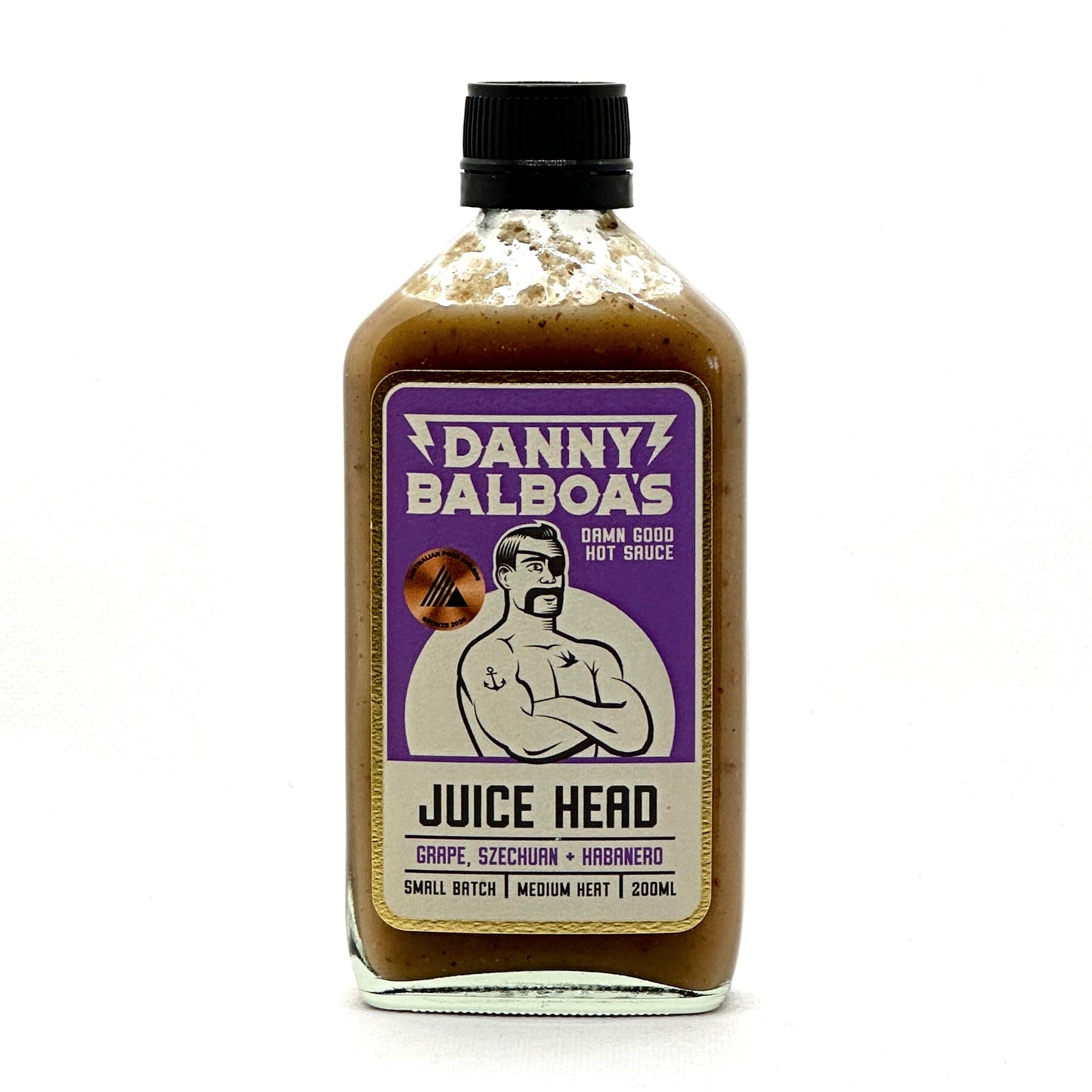 Bottle of Danny Balboa's Juice Head Sauce, with red grape, habanero, and Szechuan pepper for a vibrant flavor kick.